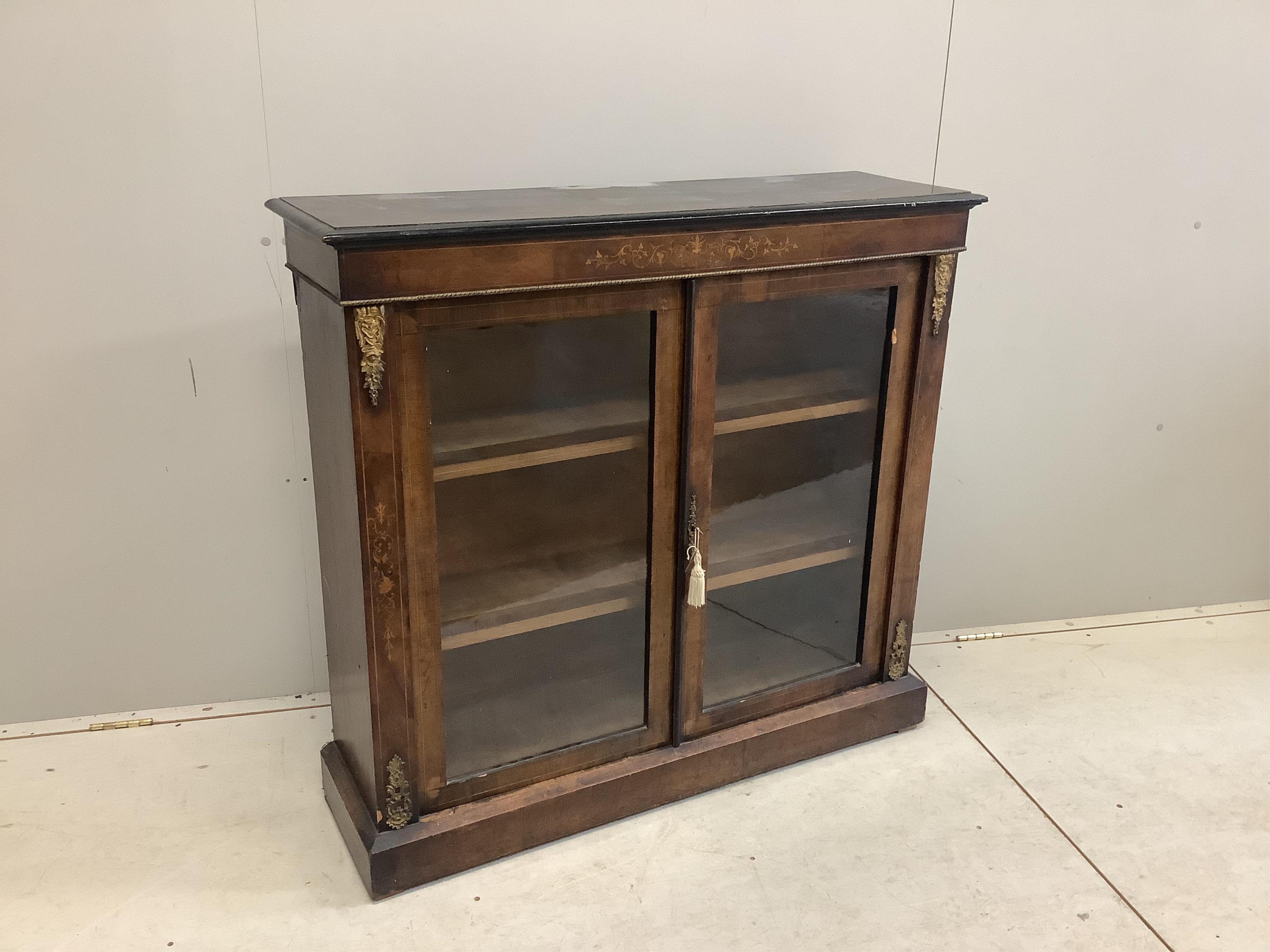 A mid Victorian gilt metal mounted inlaid walnut pier cabinet, width 107cm, depth 31cm, height 100cm. Condition - fair